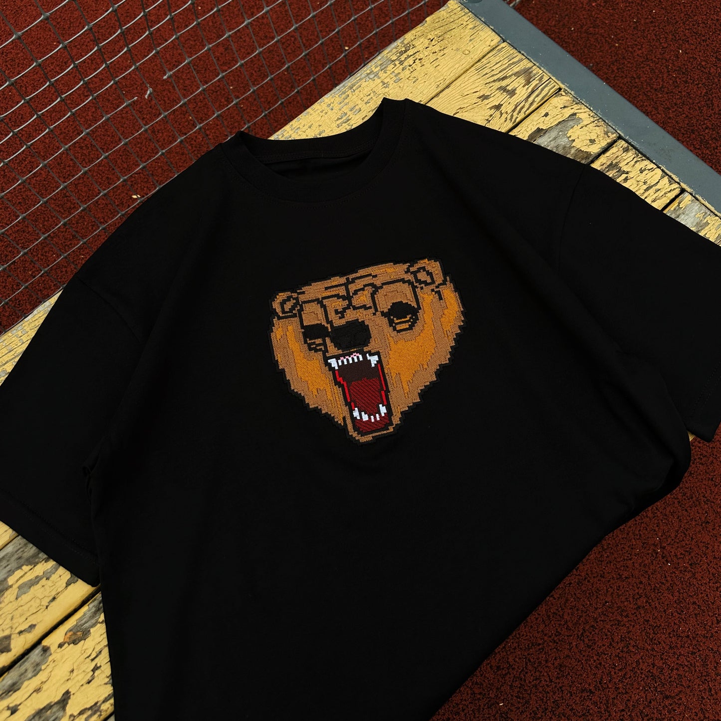 Mark tee
