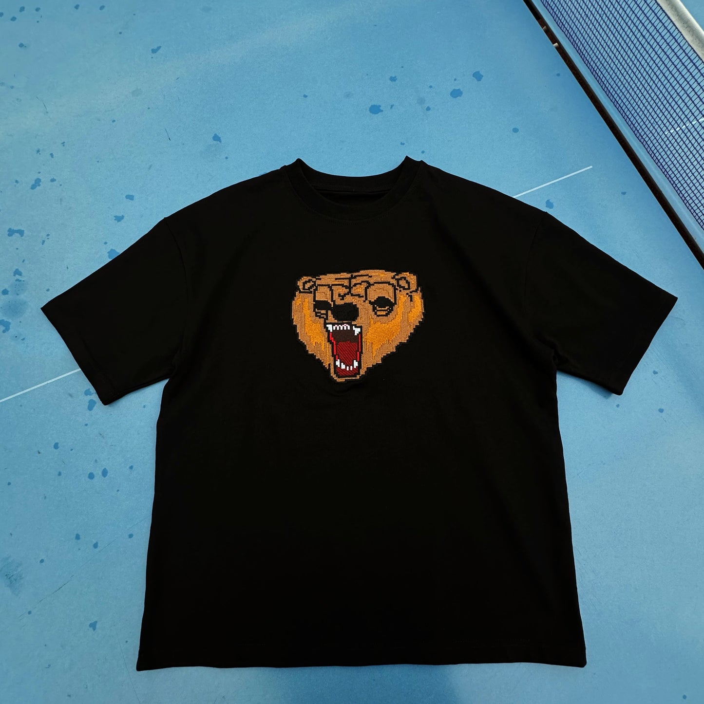 Mark tee